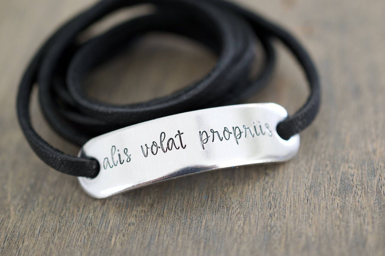 Alis Volat Propriis Bracelet | She Flies with Her Own Wings Bracelet, close up