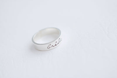Bride Hand Stamped Ring, flat lay