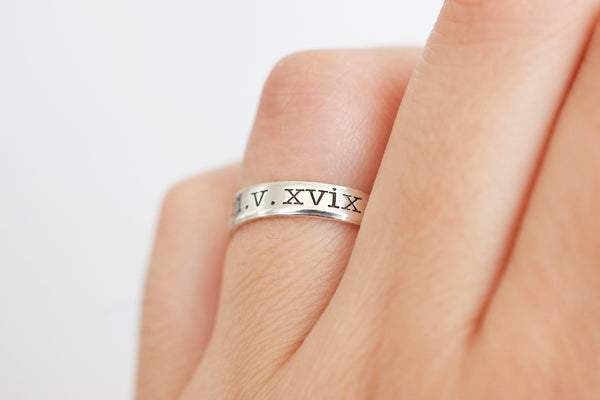 Tiffany ring with hot sale roman numerals on it