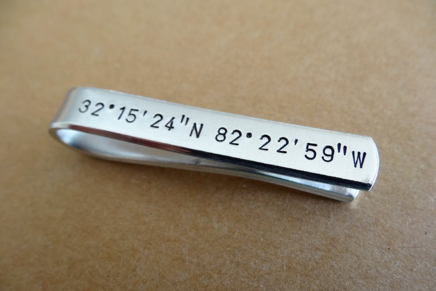 Coordinates Tie Clip, close up