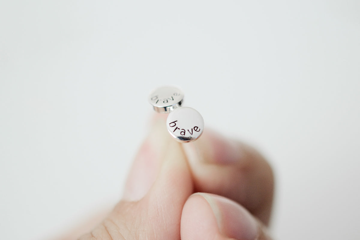 Brave Stud Earrings, close up