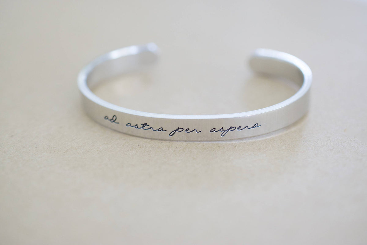 Ad Astra Per Aspera Bracelet | Latin Cuff Bracelet, displayed laying flat