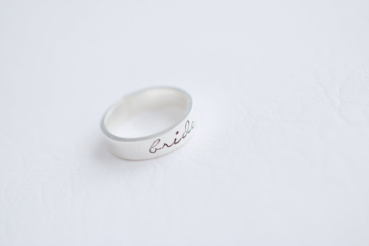 Bride Hand Stamped Ring, flat lay