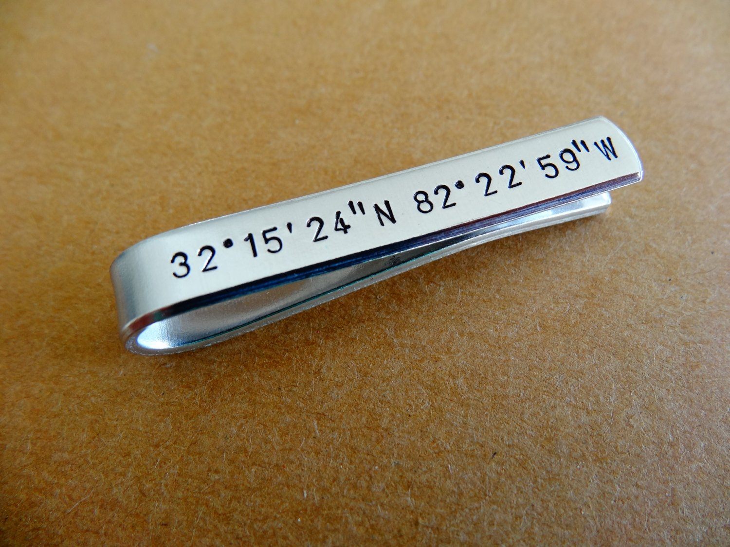 Coordinates Tie Clip, close up