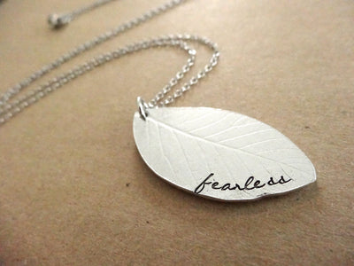 Fearless Necklace, tan background